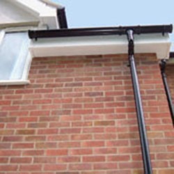 Mixed colour guttering installation & soffit repair in Somerset